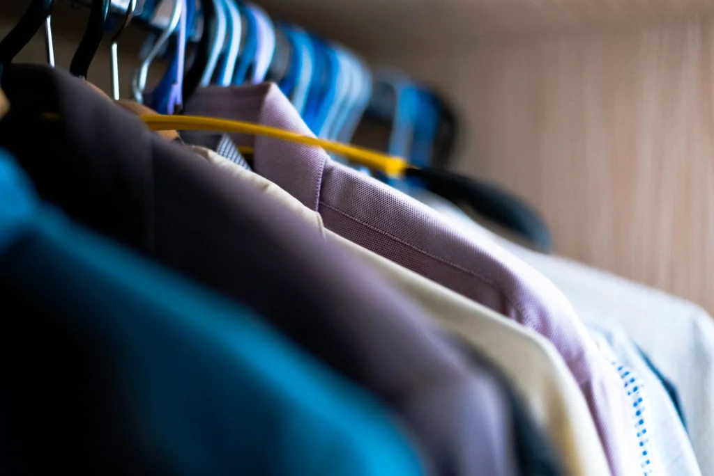Professionally dry cleaned clothes ready for seasonal storage